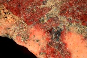 Piece of Agate magnified with Tomlov portable microscope.
