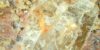 Gemstone magnified. Possibly a diamond.